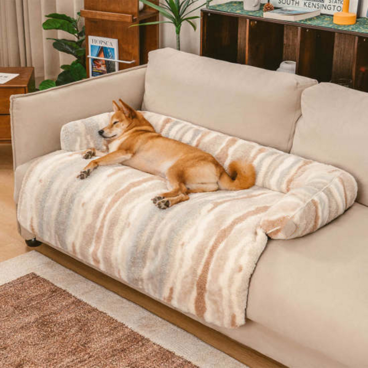 Elegant Nordic style plush pet protector mat on a sofa, providing a cozy dog bed and keeping furniture clean