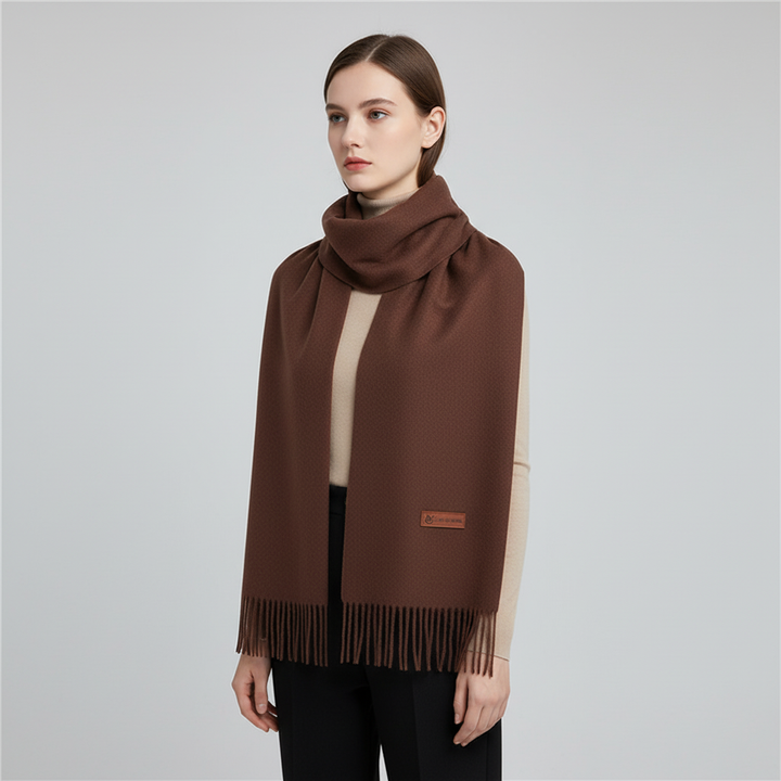 Elegant women's oversized scarf, offering soft comfort and versatile winter style.