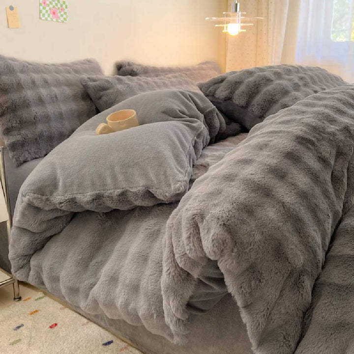 High-quality plush faux rabbit fur duvet cover set, durable & soft.