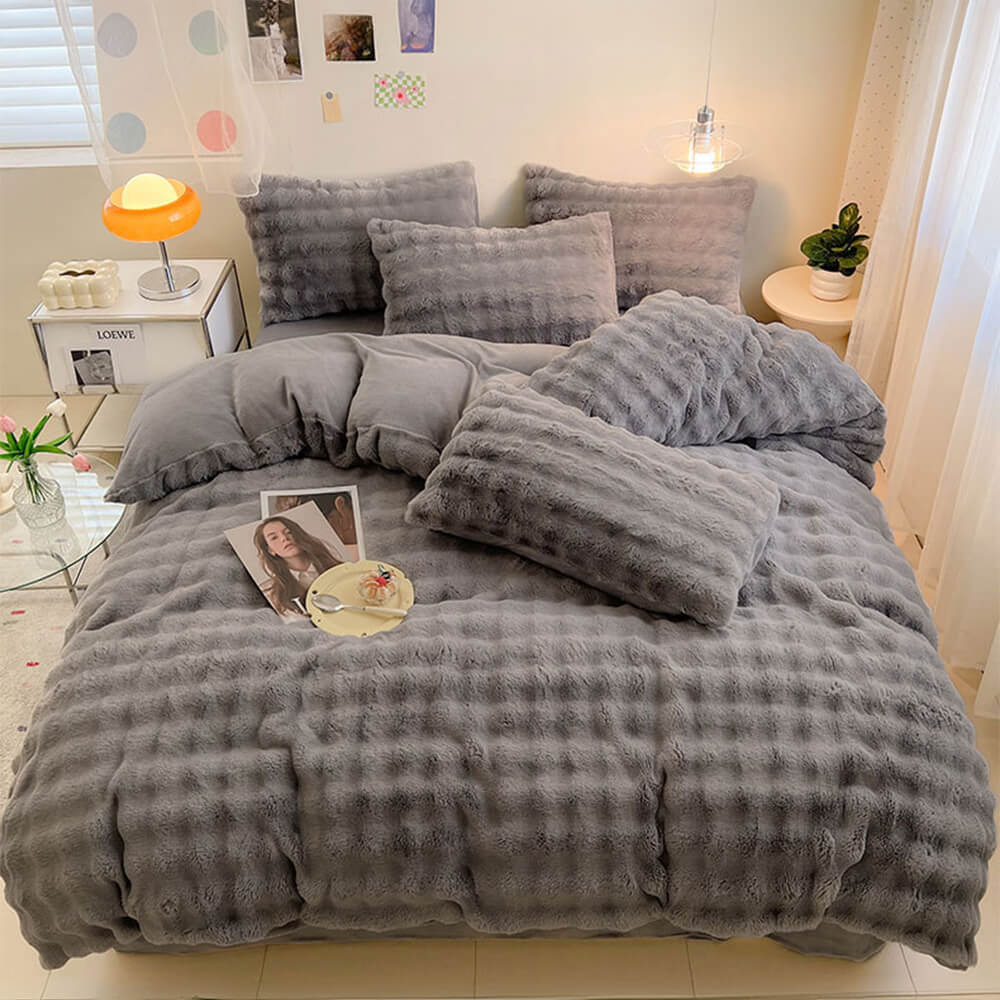 Faux rabbit fur duvet cover and sheet set, enhancing bedroom aesthetics.