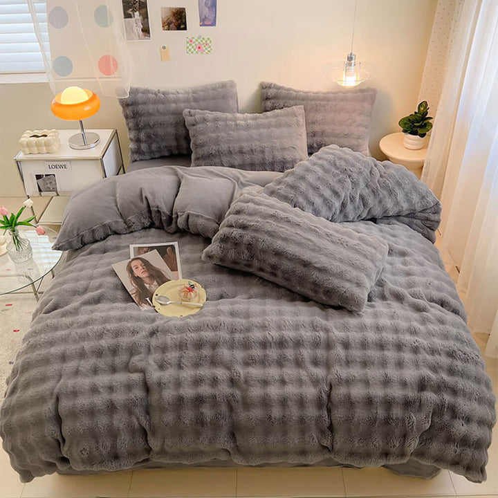 Faux rabbit fur duvet cover and sheet set, enhancing bedroom aesthetics.