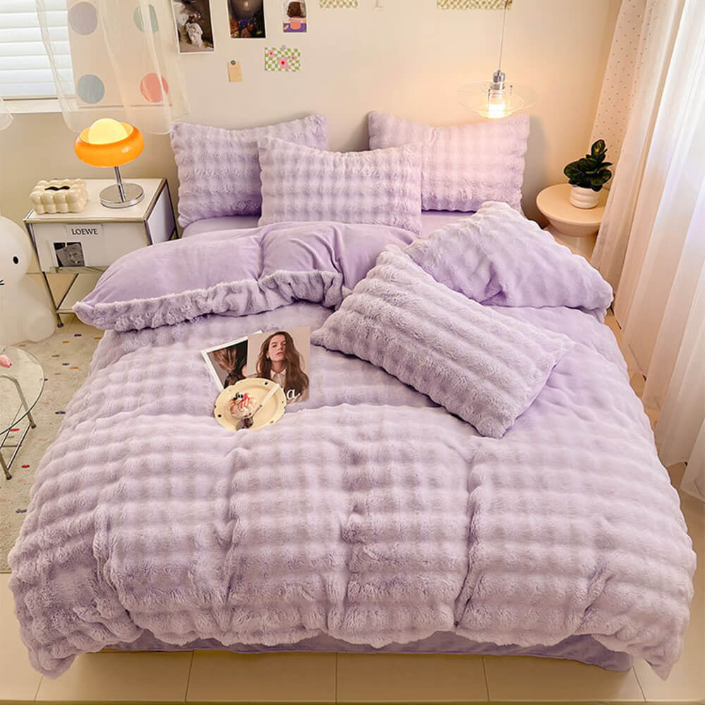 Plush faux rabbit fur duvet cover & sheet set for a luxurious sleep experience.