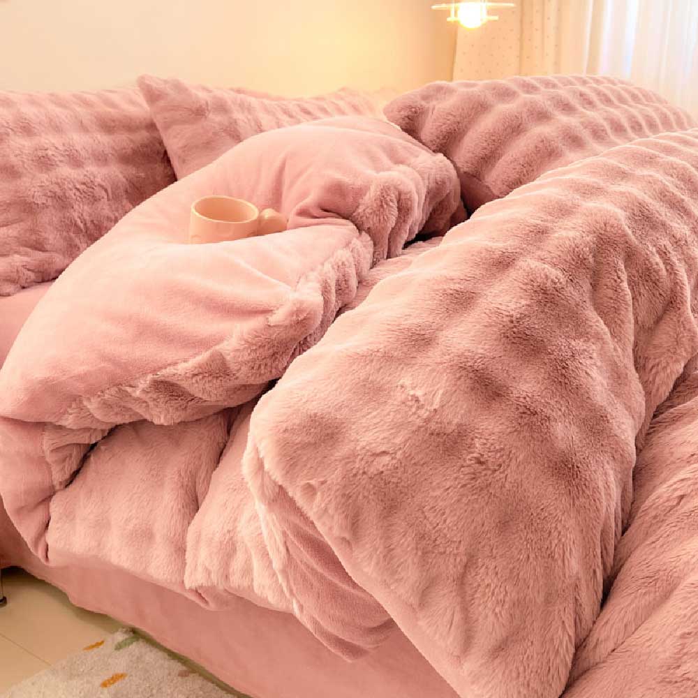 Bedroom scene featuring a beautiful plush faux rabbit fur duvet cover set.
