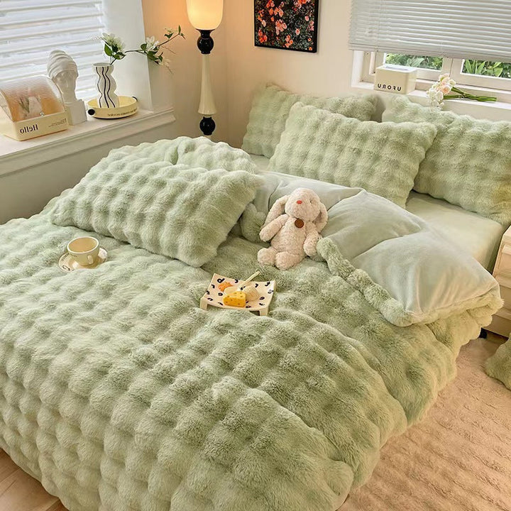 Hypoallergenic and plush faux rabbit fur duvet cover for a cozy retreat.