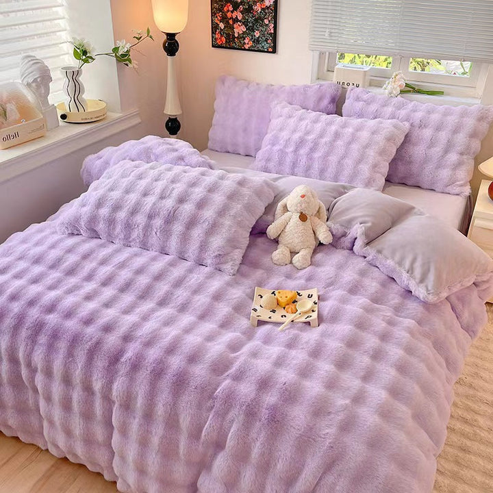Elegant home decor with a luxurious faux rabbit fur bedding set.
