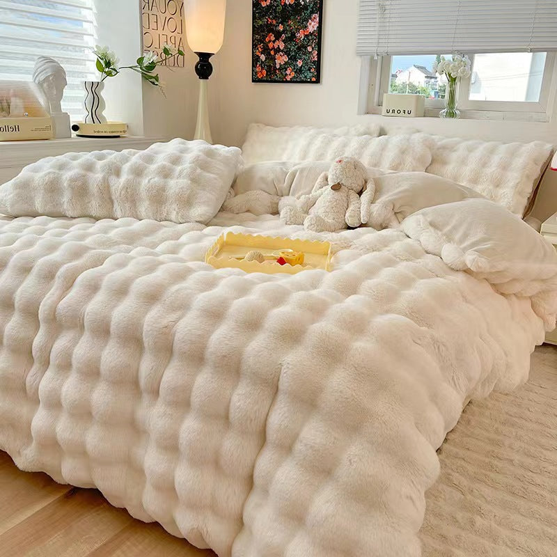 Super soft faux rabbit fur duvet cover and sheet set, ultimate coziness.