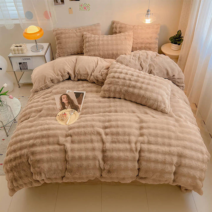 Elegant bedding set with plush faux rabbit fur for ultimate comfort.