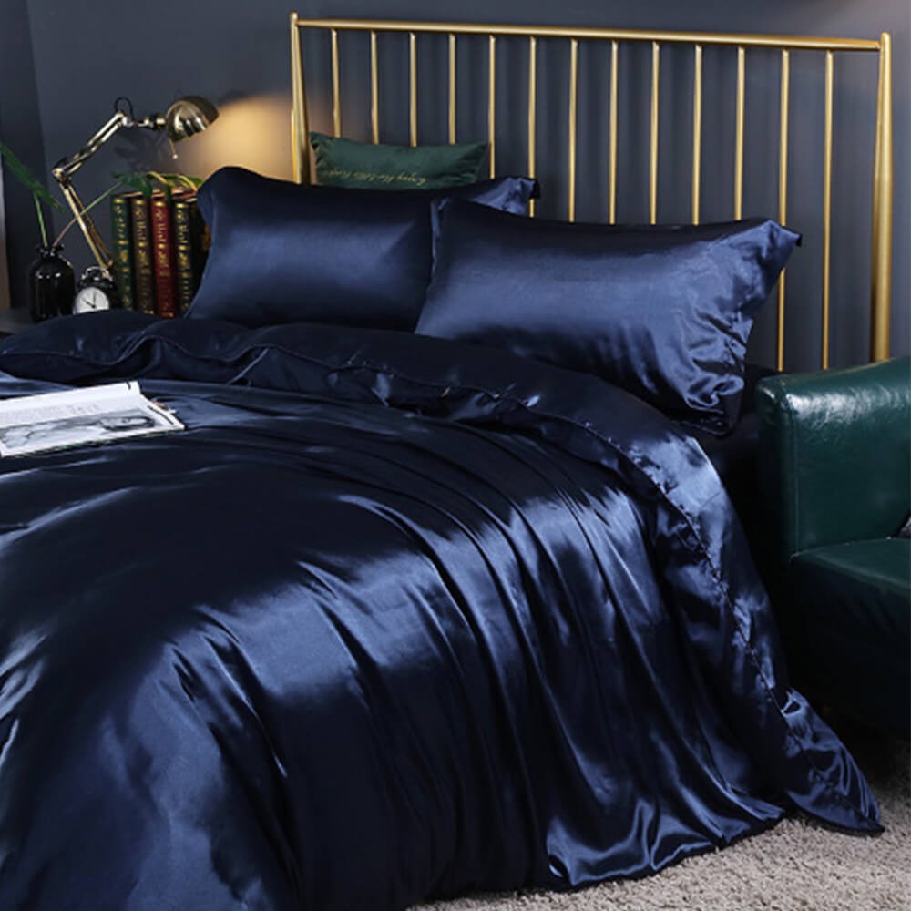 Double-sided satin bedding set in cream, providing ultimate smooth comfort and sophisticated home textiles.
