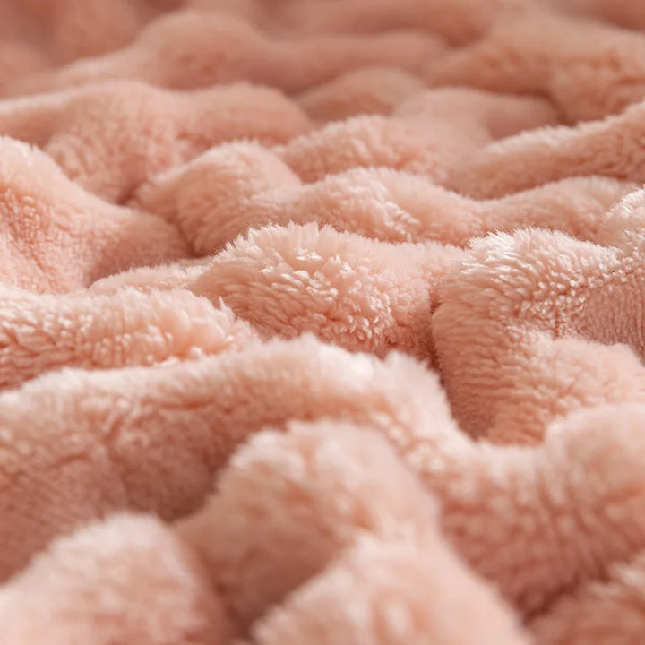 Generous-sized soft fleece blanket, providing ultimate warmth, plush comfort & stylish home decor.