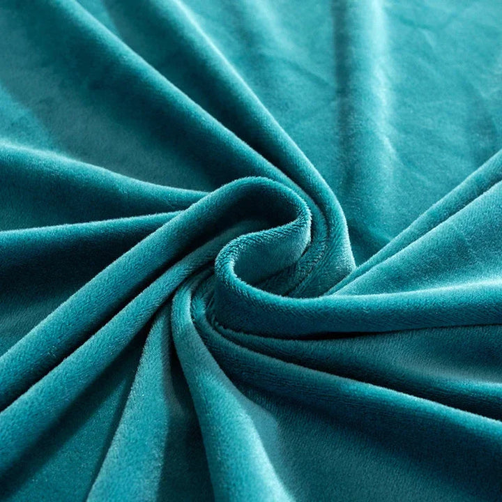 Elegant Sofina velvet couch slipcover, perfect for modern living room decor.