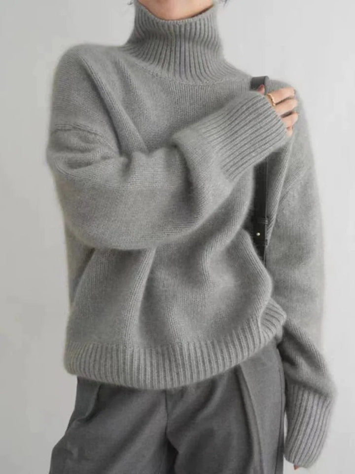 Premium women's turtleneck sweater. Super soft, warm, and luxurious, perfect for chilly days.