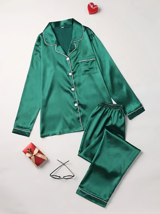 Stylish two-piece silk loungewear set for women, modeled, showing relaxed fit and chic design.