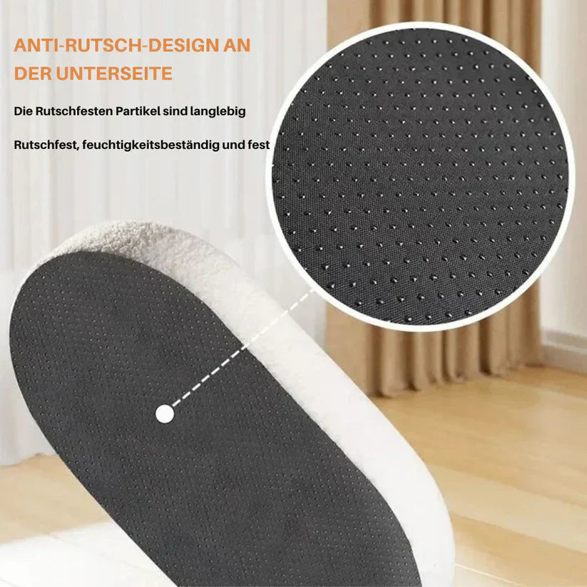 Integrated sisal scratching surface on a cozy luxury cat bed, perfect for feline comfort and play.