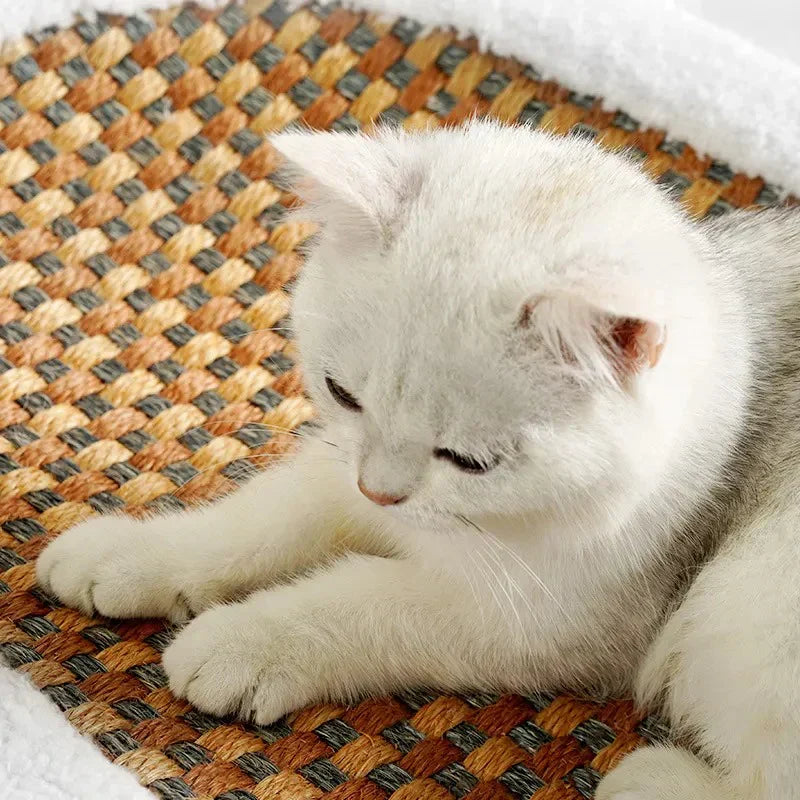 Elegant grey luxury cat bed with built-in scratching pad, providing a comfortable and engaging space for cats.