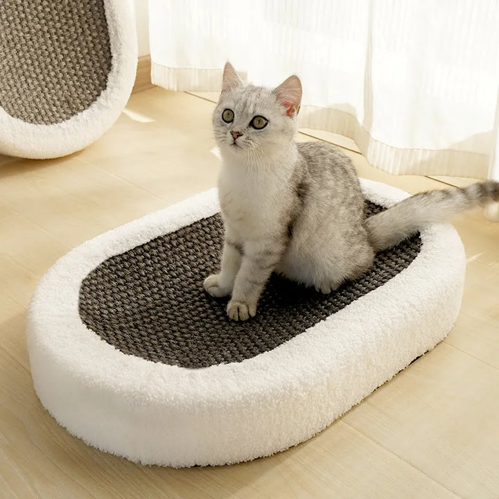 Close-up of a sturdy cat scratching pad integrated into a soft, luxurious cat bed, pet accessories.