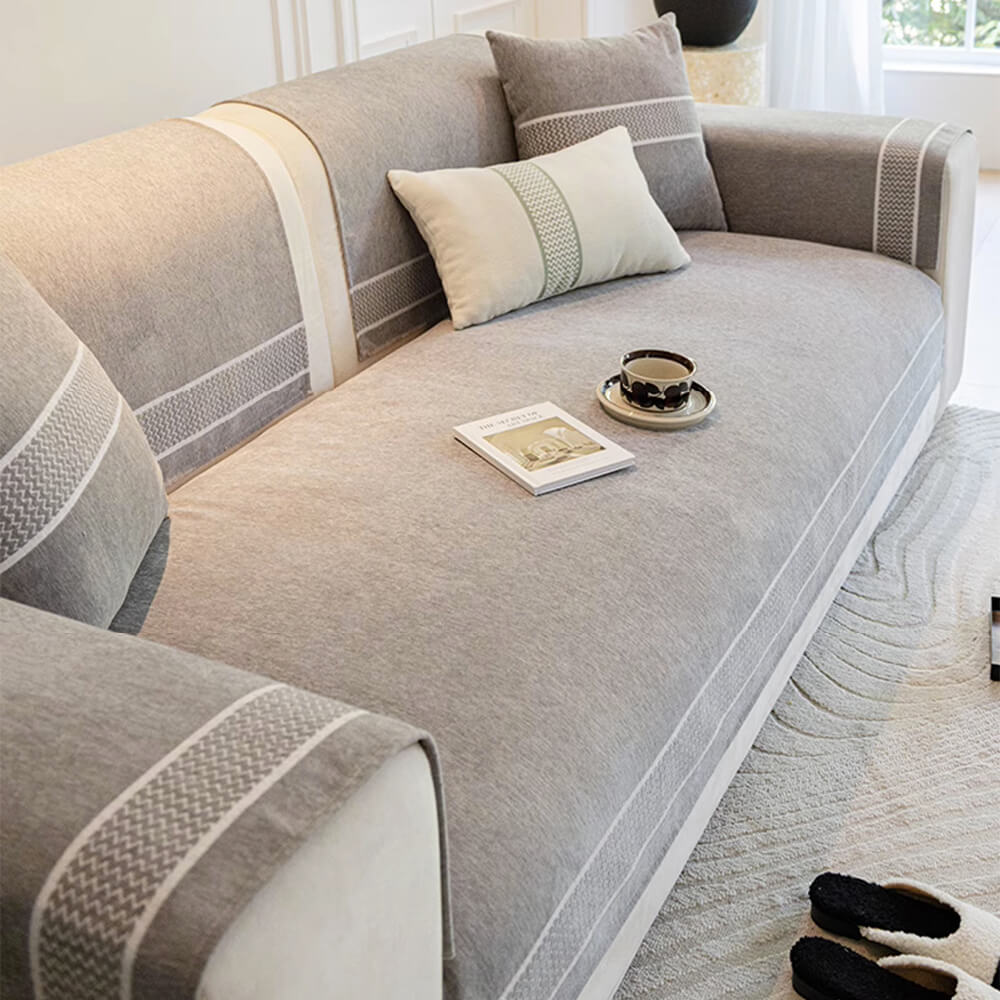 Stylish jacquard weave on a scratch-resistant chenille sofa cover, perfect for a luxury feel.