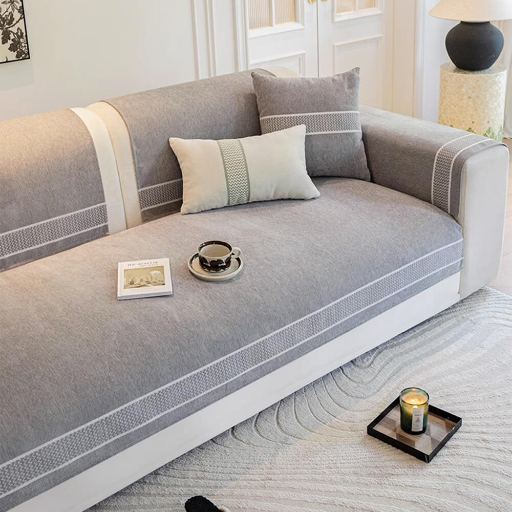 Vibrant blue chenille jacquard sofa cover, scratch-resistant, adding a pop of color to home decor.