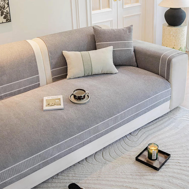Vibrant blue chenille jacquard sofa cover, scratch-resistant, adding a pop of color to home decor.