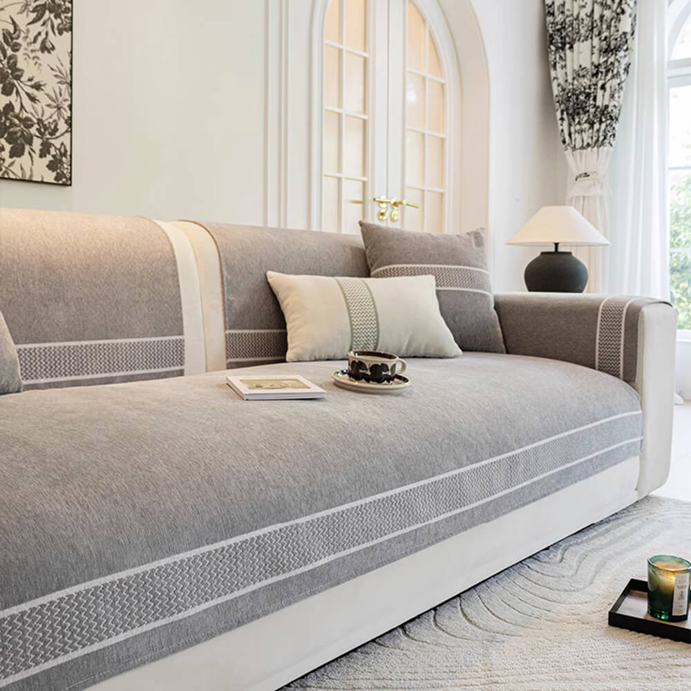 Overhead shot of a chenille jacquard scratch-resistant sofa cover, highlighting its full coverage.