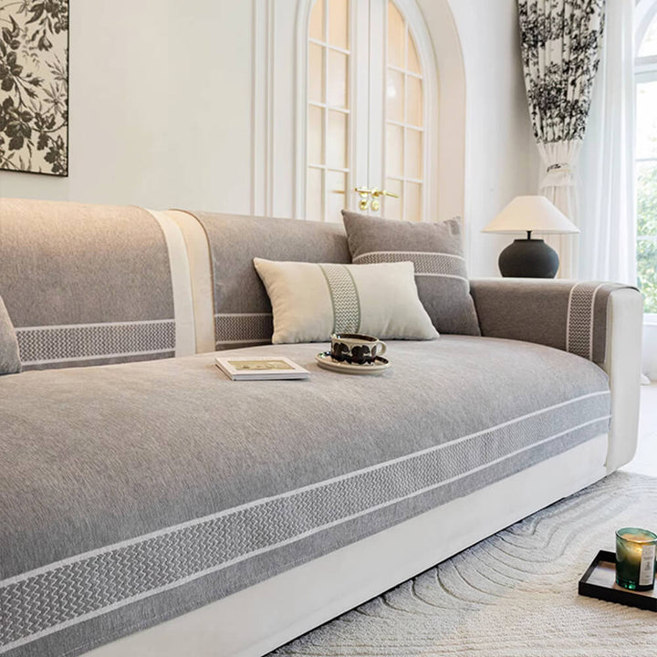 Overhead shot of a chenille jacquard scratch-resistant sofa cover, highlighting its full coverage.