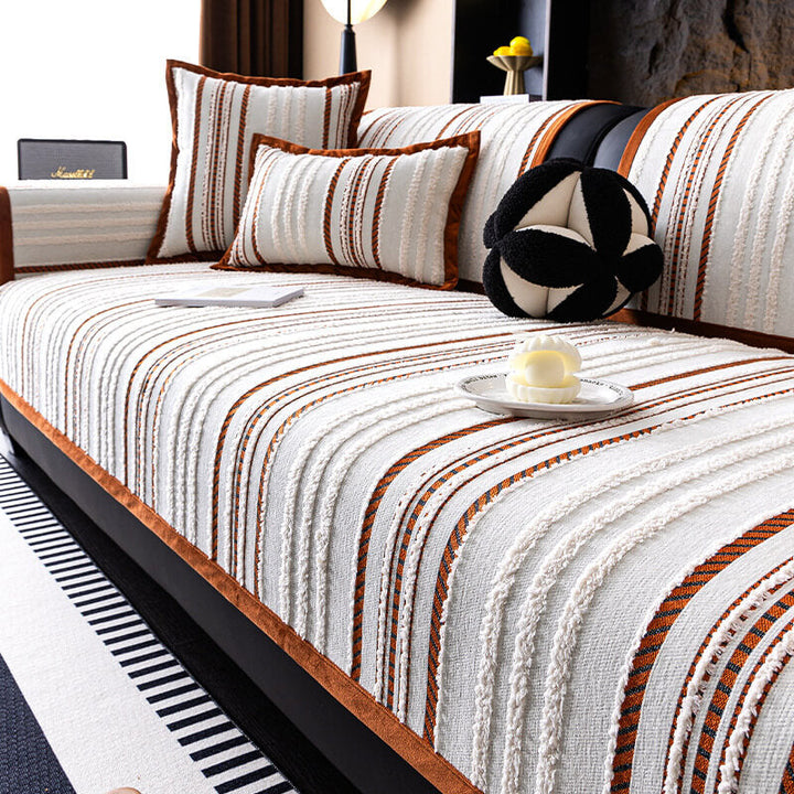 Elegant chenille sofa cover, deep gray, providing non-slip protection for furniture.