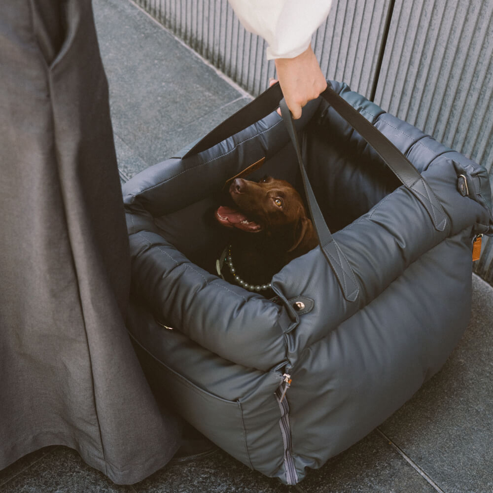 Faux leather dog car booster for small pets, enhancing safety & comfort on the go.