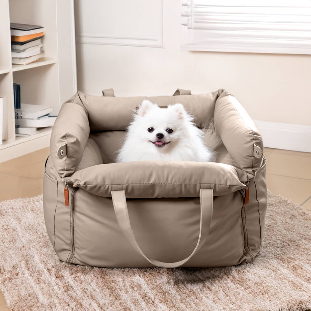 Pet comfort booster, a stylish faux leather dog car seat for secure travel.
