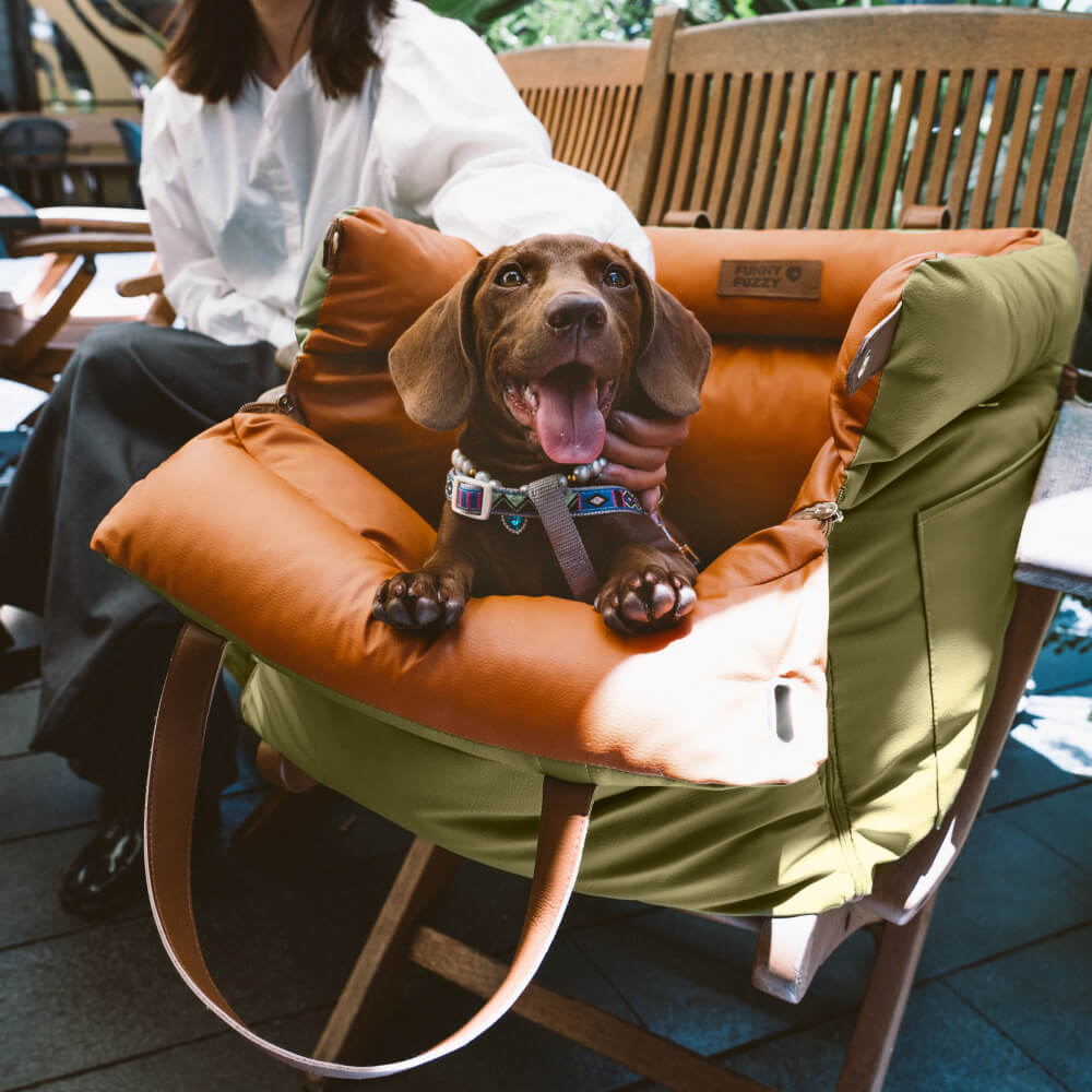 Elegant faux leather dog travel seat, a stylish car accessory for pampered pets.