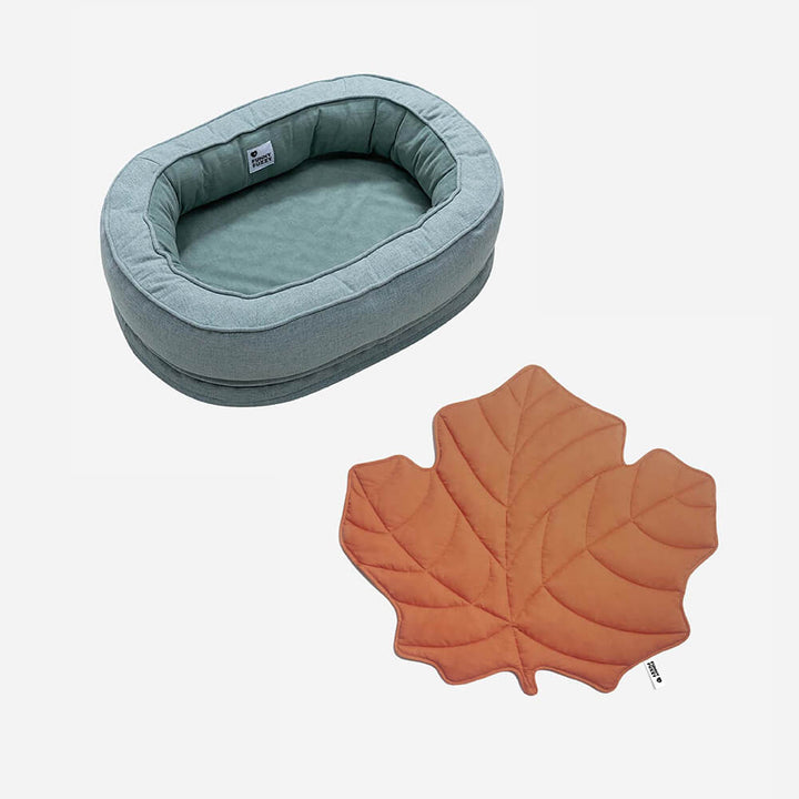 Luxury pet bedding: leaf blanket, plush donut bed for dogs.