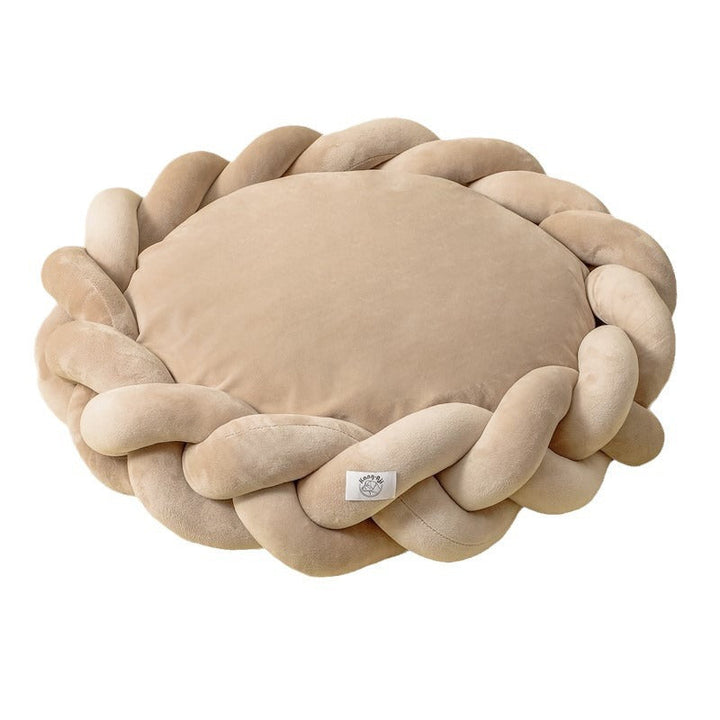 Textured fabric of a premium pet calming bed, showcasing its soft, cozy material and washable design.