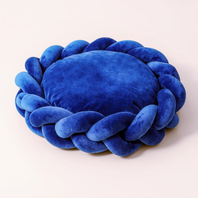 Two dogs comfortably sharing a large, oval, washable luxury calming pet bed, ultimate comfort.