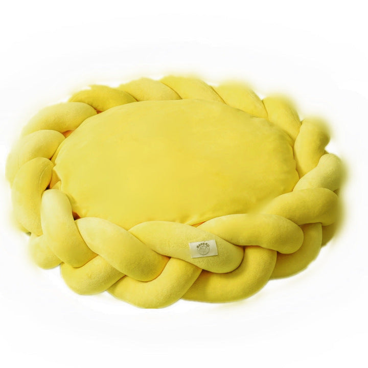 Small luxury calming dog bed, cream-colored, ideal for puppies or small breeds, removable cover.