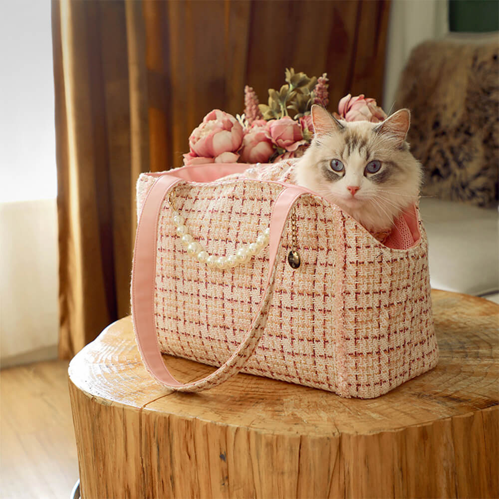 Fashionable tweed checkered pet carrier, perfect for city outings with your small dog or cat.