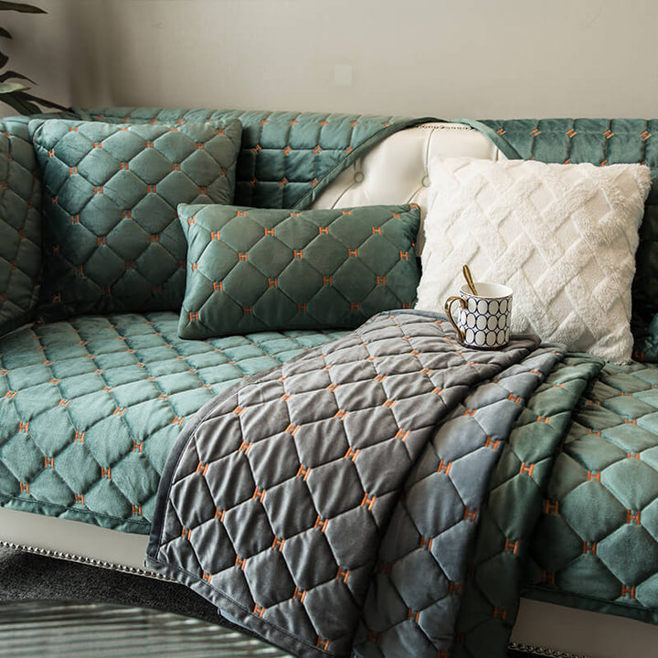 Modern luxury velvet quilted sofa throw with non-slip properties, ideal for home decor updates.