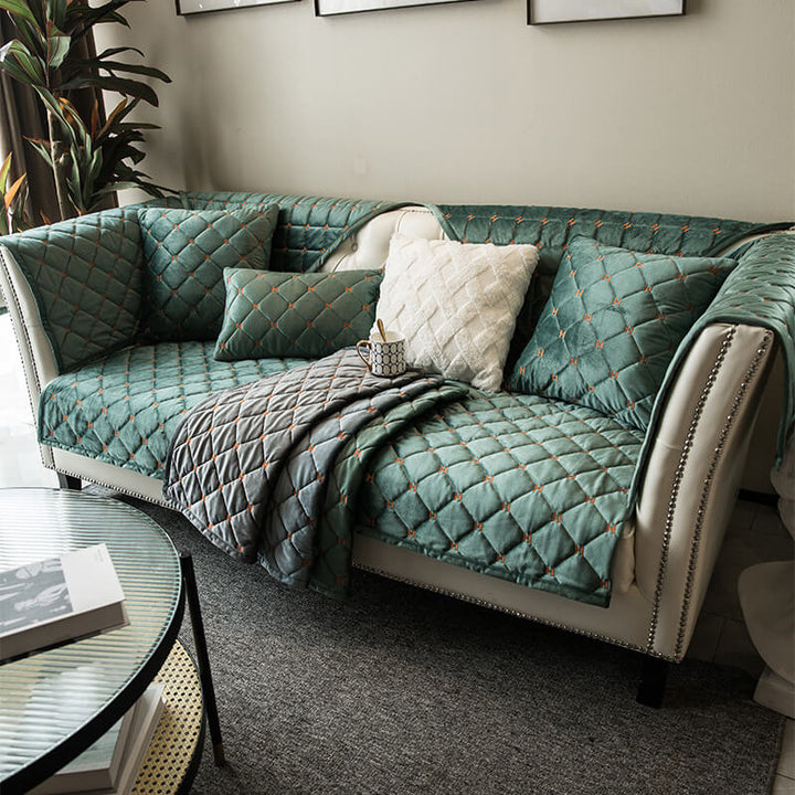 Easy-to-clean velvet sofa protector with a luxurious quilted non-slip design for everyday home decor.