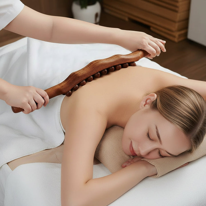 Natural wood Gua Sha massage tool for improved blood circulation & muscle recovery. Wellness fitness.