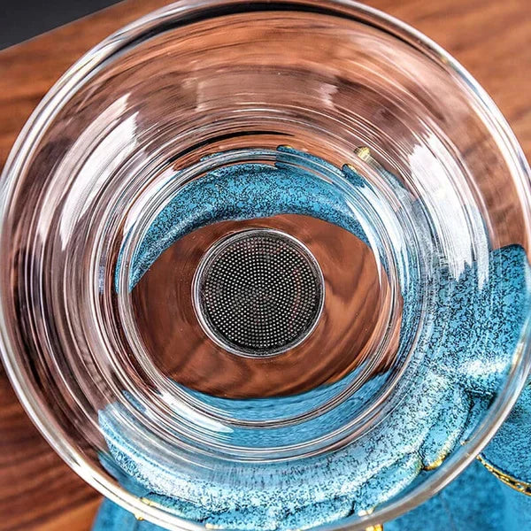 Modern elegant magnetic glass tea set with cups, perfect for home decor & daily tea enjoyment.