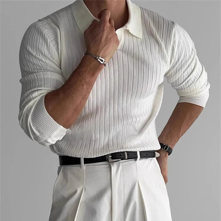 Classic women's slim fit long sleeve V-neck polo, made from comfortable ribbed knit material for elegant wear.
