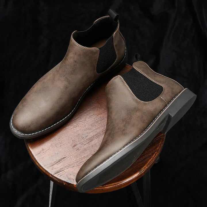 Elegant men's leather Chelsea boots, perfect dress footwear for office, events, or stylish casual looks.