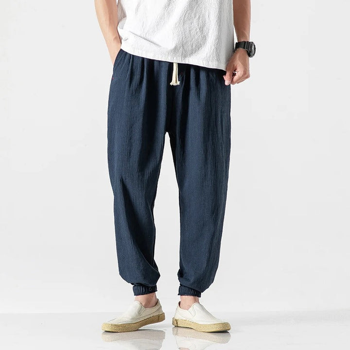 Back view: Unisex lightweight cotton blend comfort joggers with relaxed fit, great for casual & active wear.