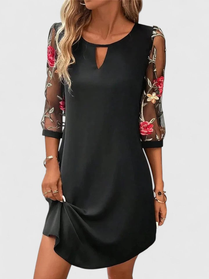 Sophisticated women's evening dress for weddings & parties. Formal wear, ideal for fall & winter special occasions.