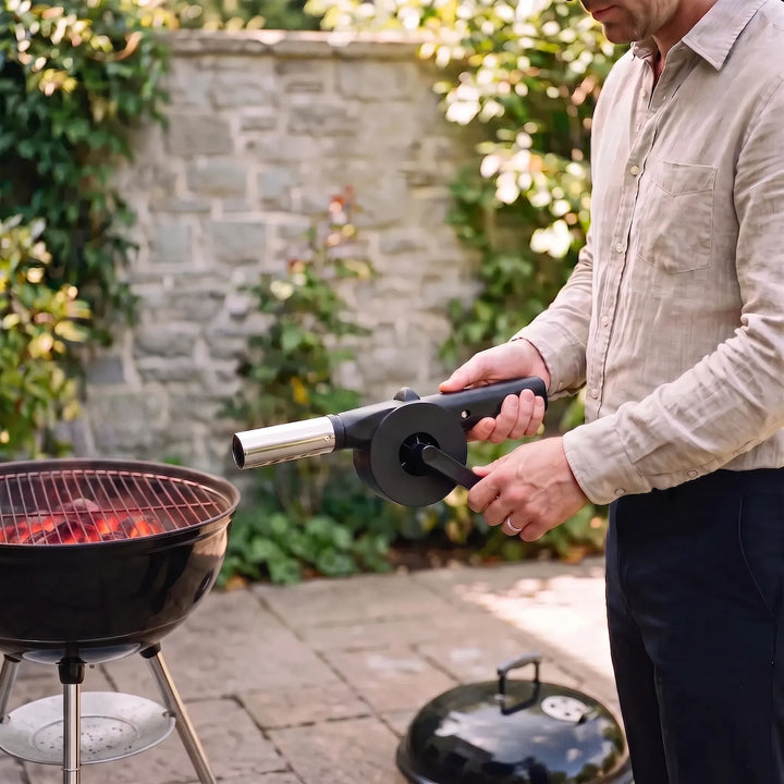 Portable manual barbecue fan, hand crank fire starter for outdoor cooking, camping gear, and picnic grills.