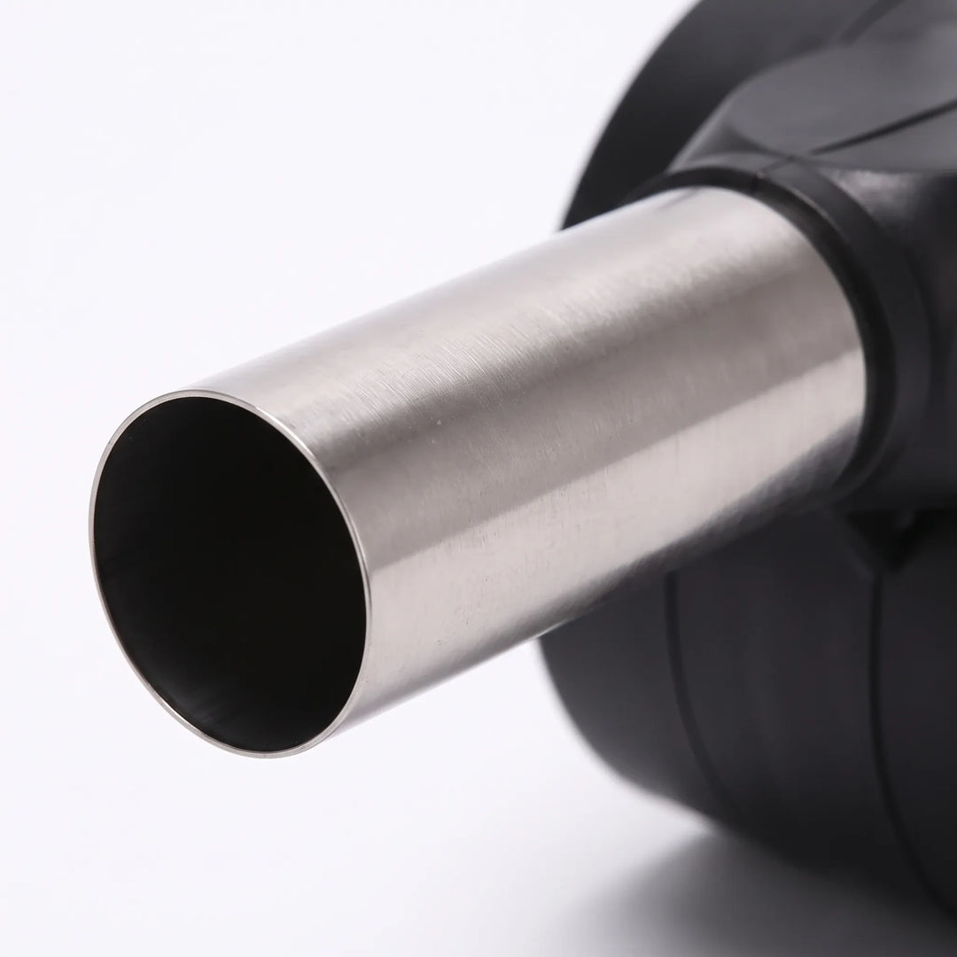 Compact manual grill blower, hand crank fan for easy charcoal starting, perfect outdoor cooking accessory.