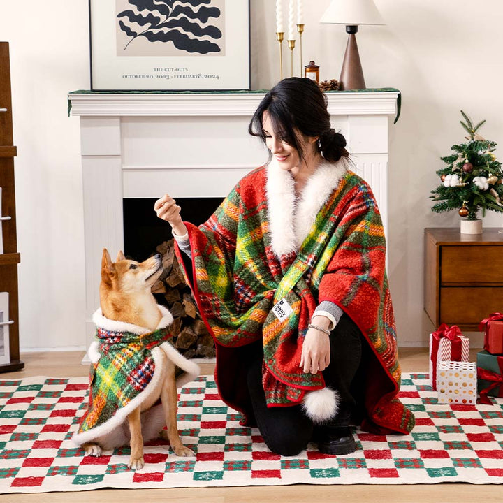 Plaid poncho set for pets and owners, ideal for outdoor winter activities, warm dog apparel.