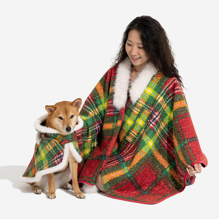 Matching red plaid poncho for dog, showcasing the easy-to-wear design, cozy pet attire.