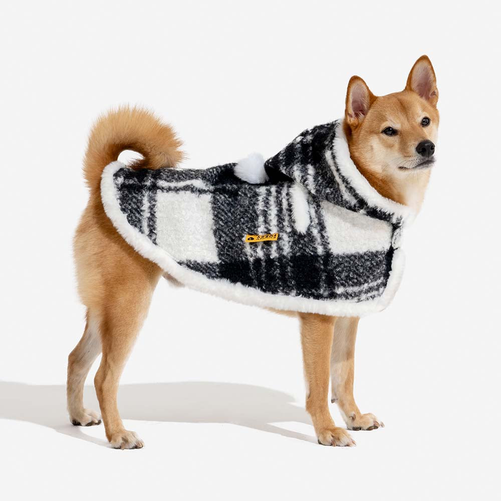 Matching pet and owner plaid ponchos, perfect holiday outfits, warm dog apparel and human wear.