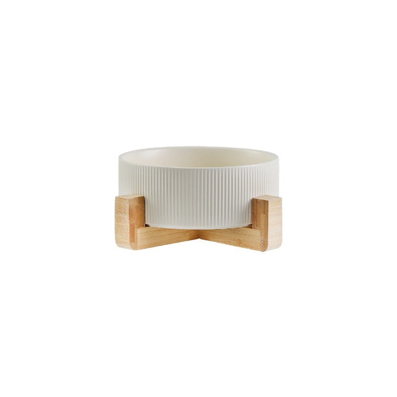 Two-bowl pet feeding solution: matt black ceramic dishes in an elegant wooden base.