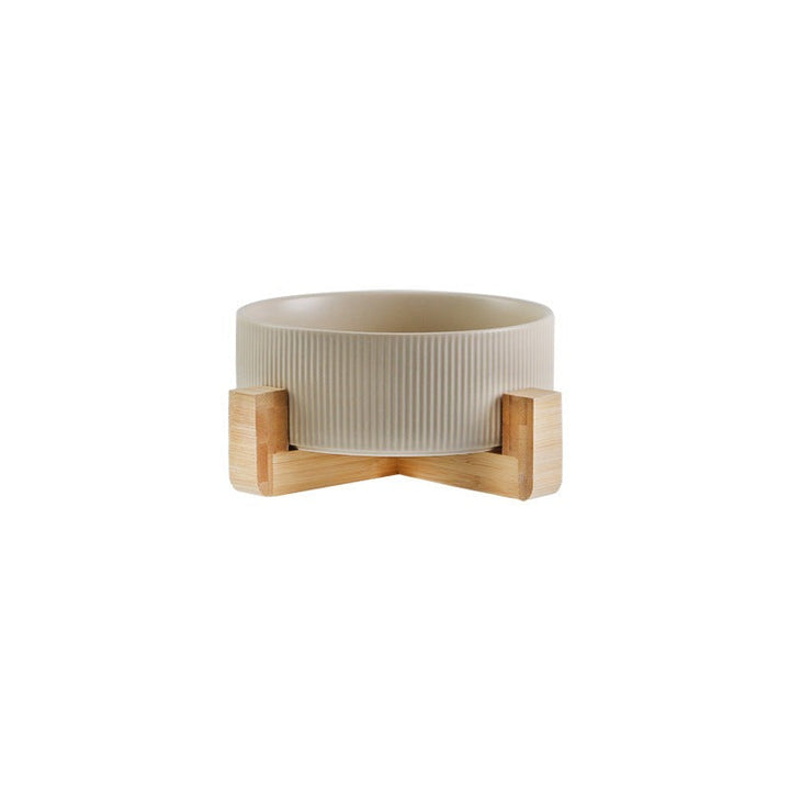 Top-down view of the matt green ceramic pet bowls, showcasing their depth and clean design.