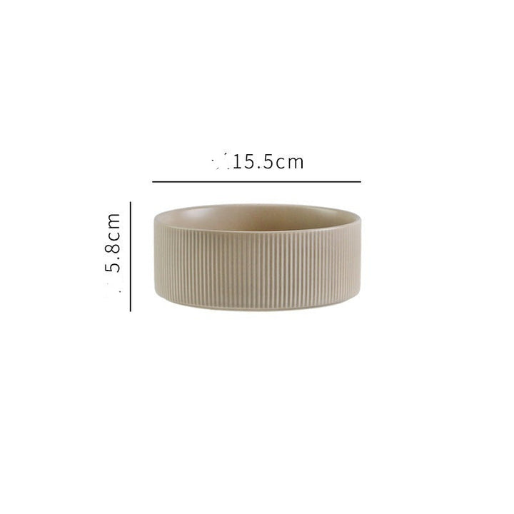 Complete pet feeding solution: matt green ceramic bowls on a sturdy, elevated wooden stand.