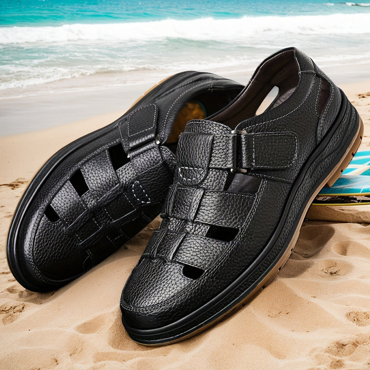 Brown men's closed-toe walking sandals with adjustable straps, ideal comfortable summer footwear.